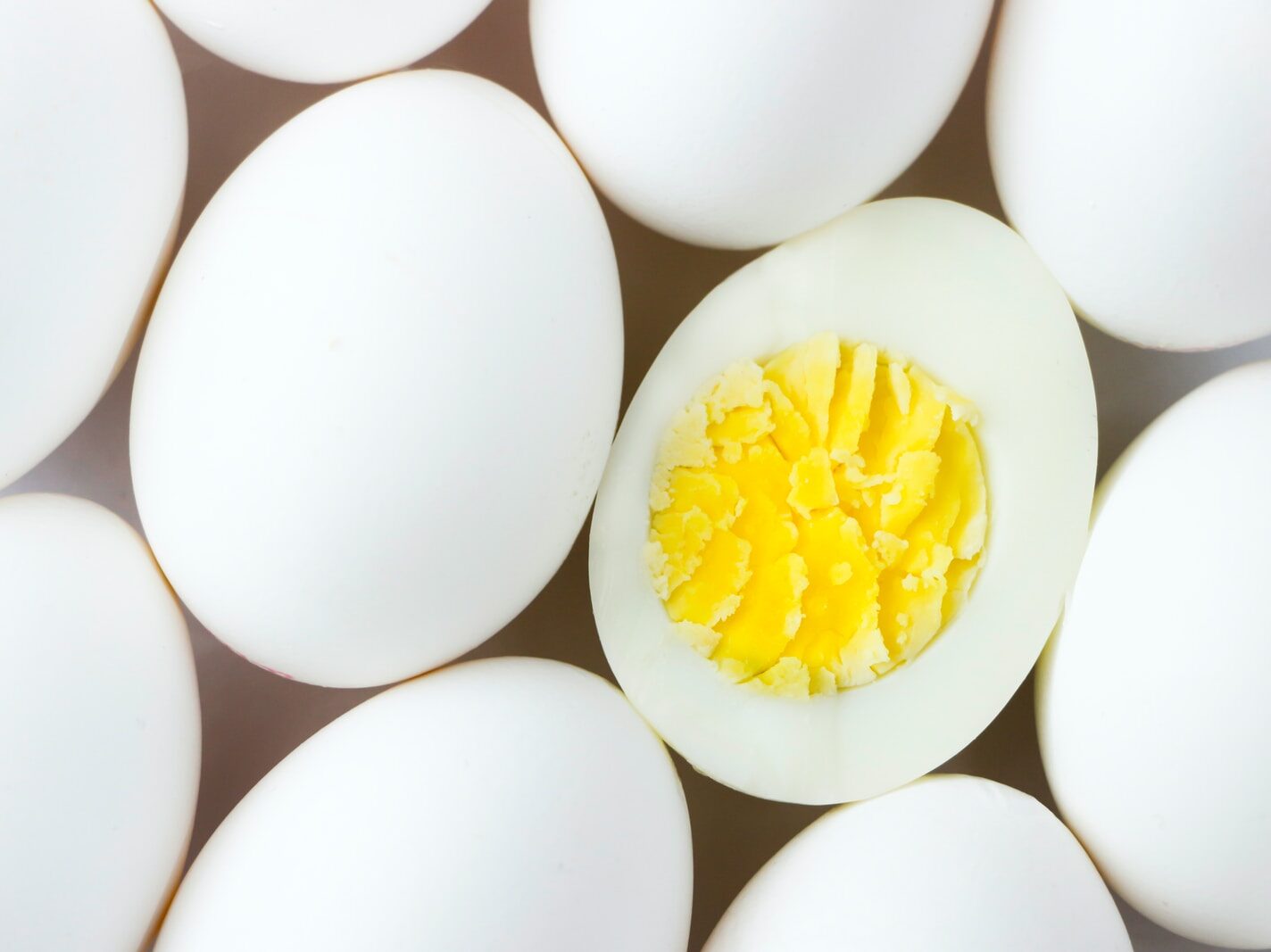 white egg lot on brown wooden table