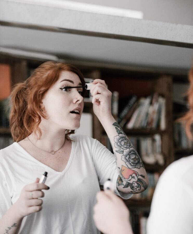 woman holding makeup rush