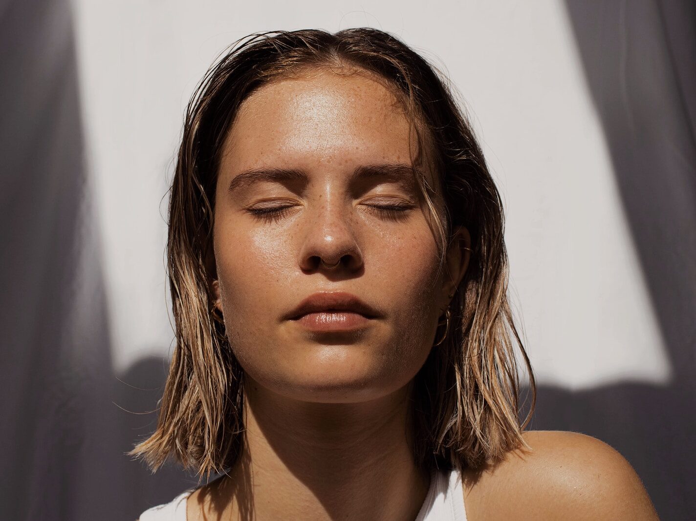 woman in white tank top