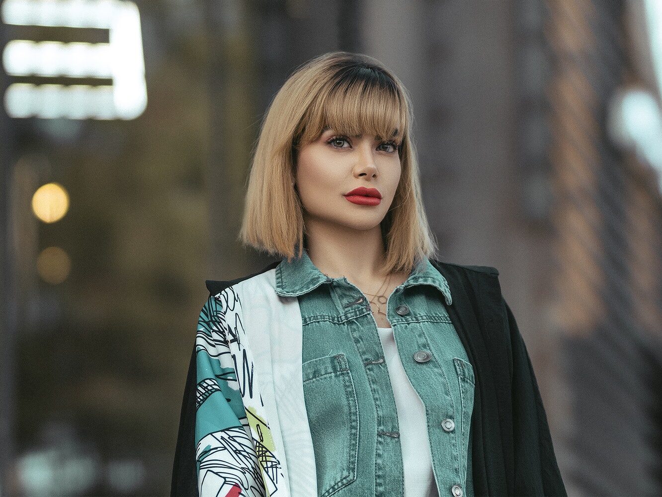 A Woman Wearing Denim Clothes with Blazer