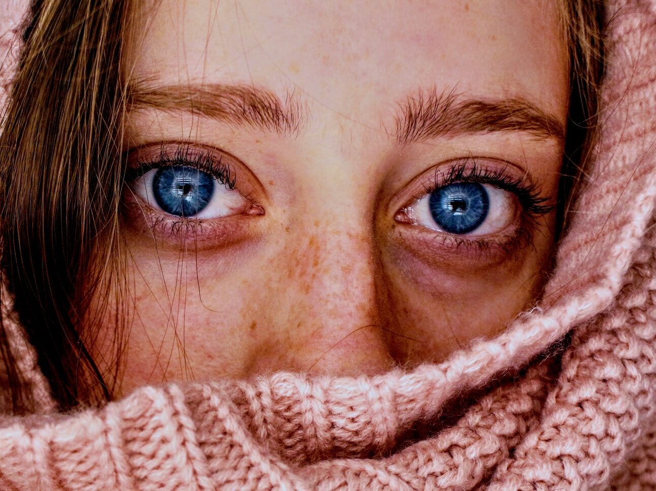 Woman With Blue Eyes Wrapped in a Pink Cloth