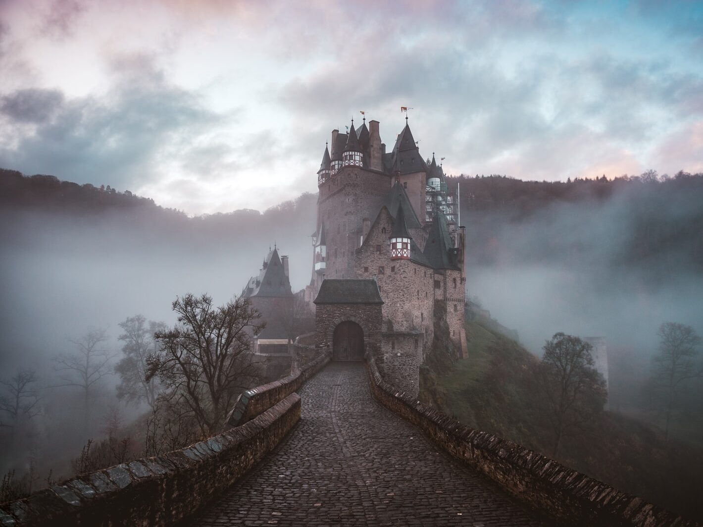 closeup photo of castle with mist