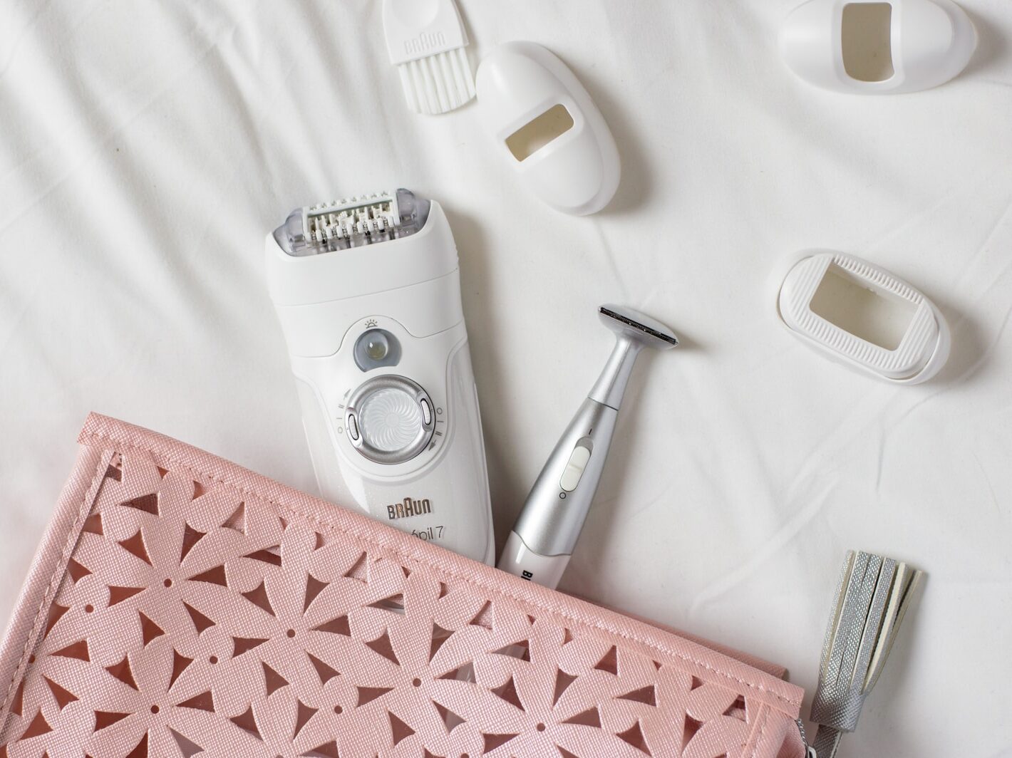 white shaver on white textile