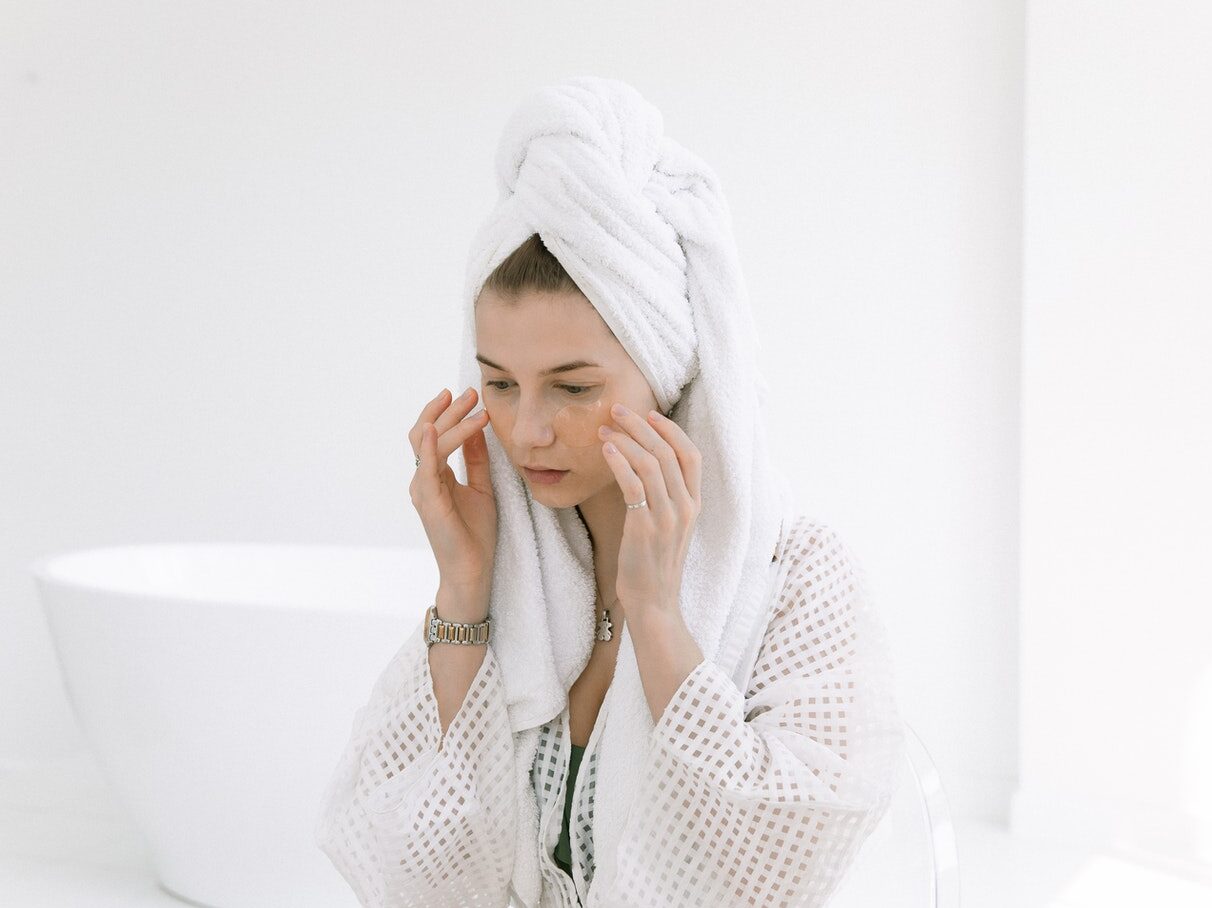Photo Of Woman Touching Her Face