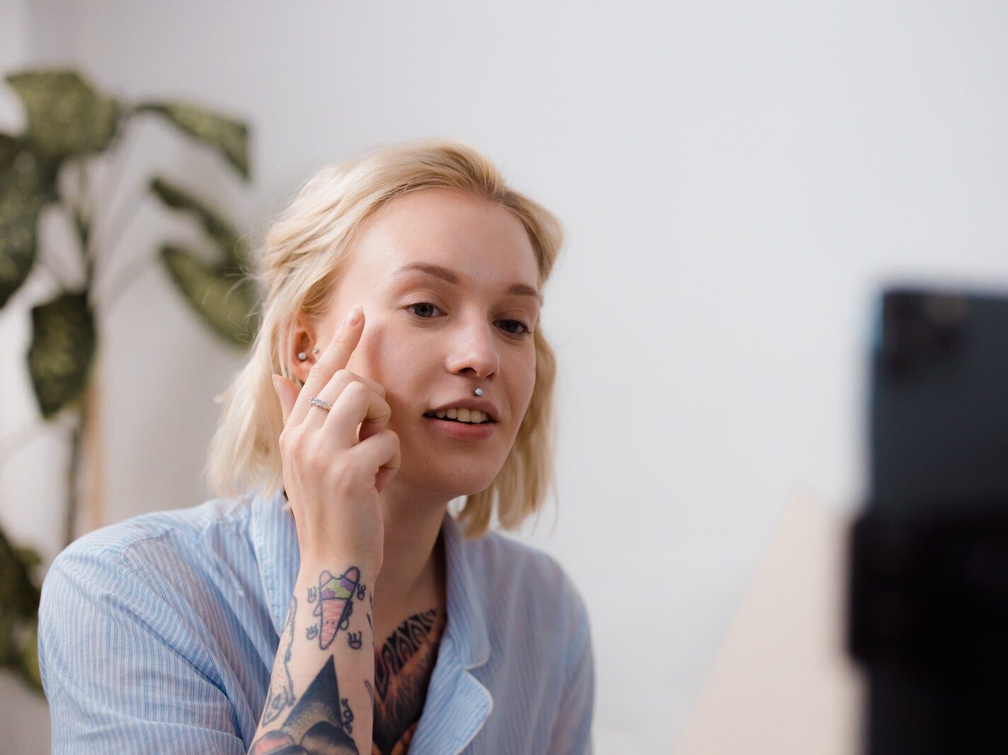 A Woman Vlogging while Applying Makeup