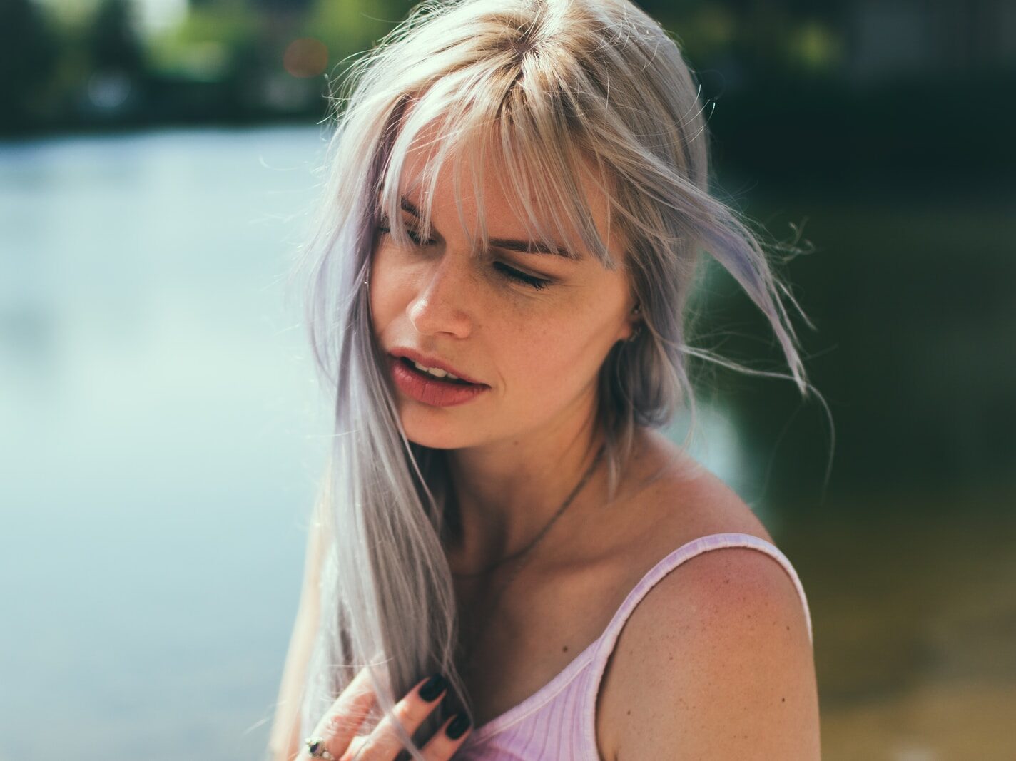 woman wearing pink spaghetti strap top