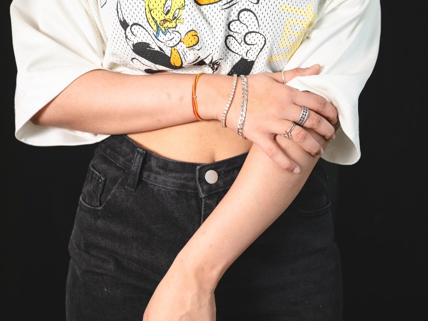 woman in white shirt and blue denim jeans