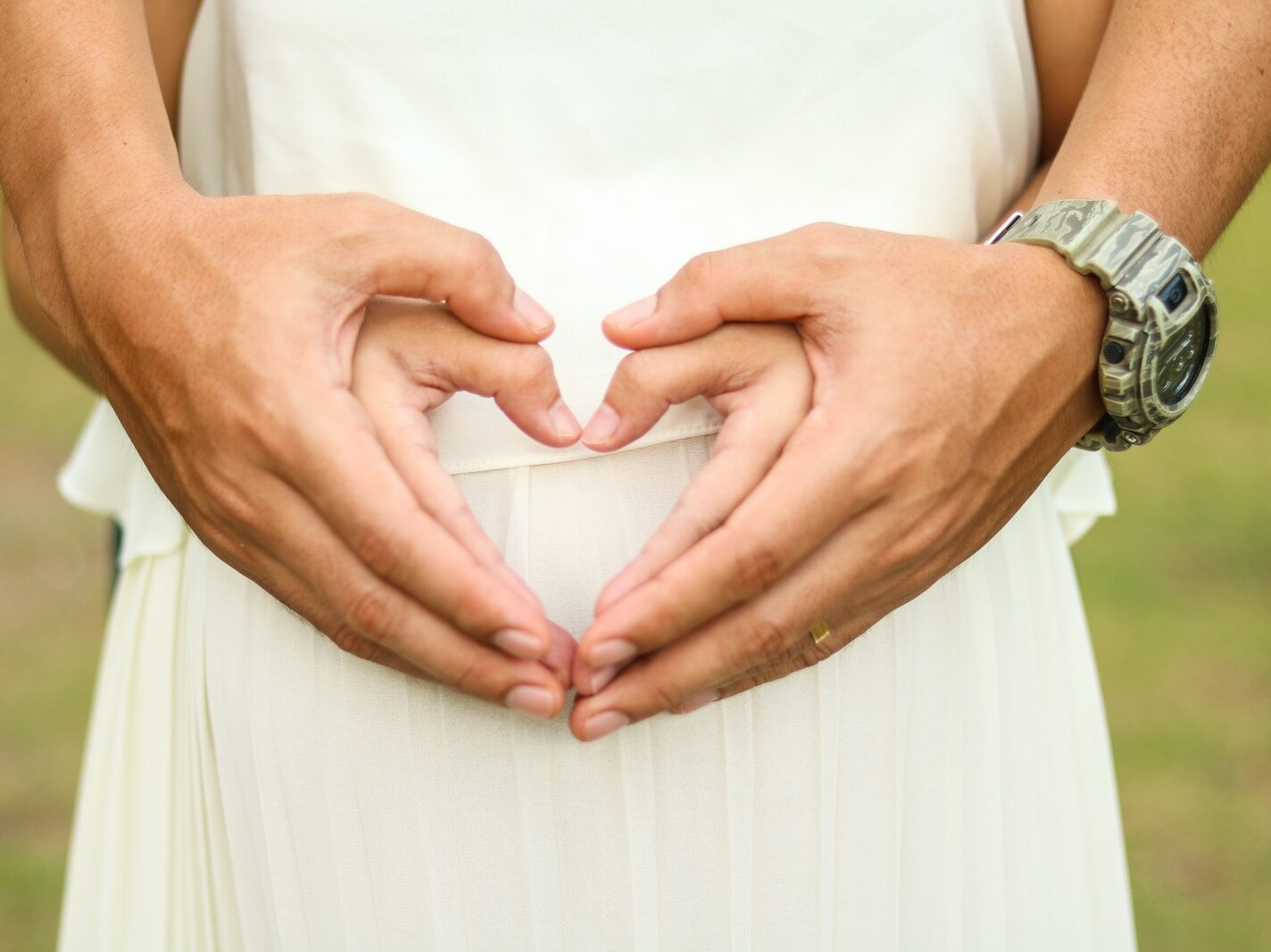 person wearing white dress