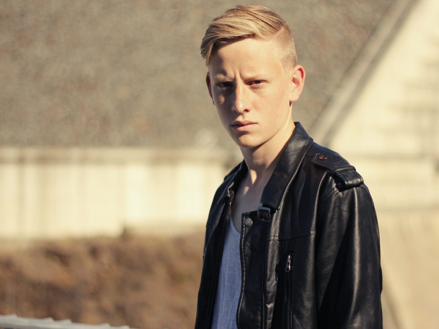 men's black leather button-up jacket