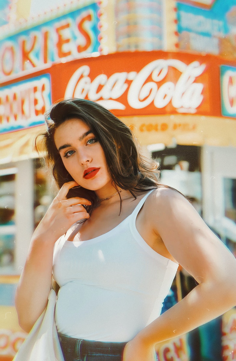 Trinity LaKose - ČasProŽeny.cz Selective Focus Photo of a Woman in a White Tank Top Looking at the Camera