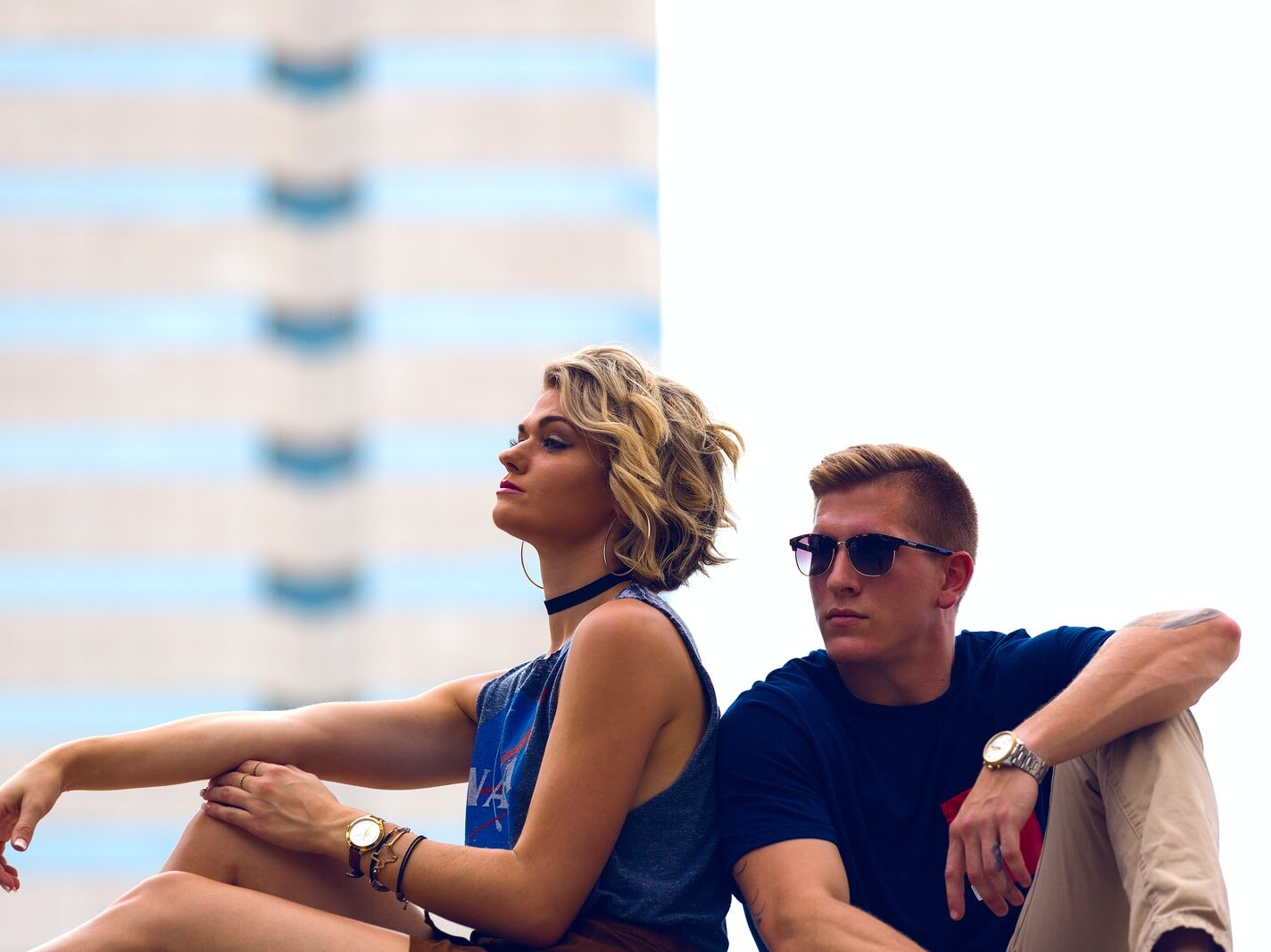 man and woman sitting posing for photo