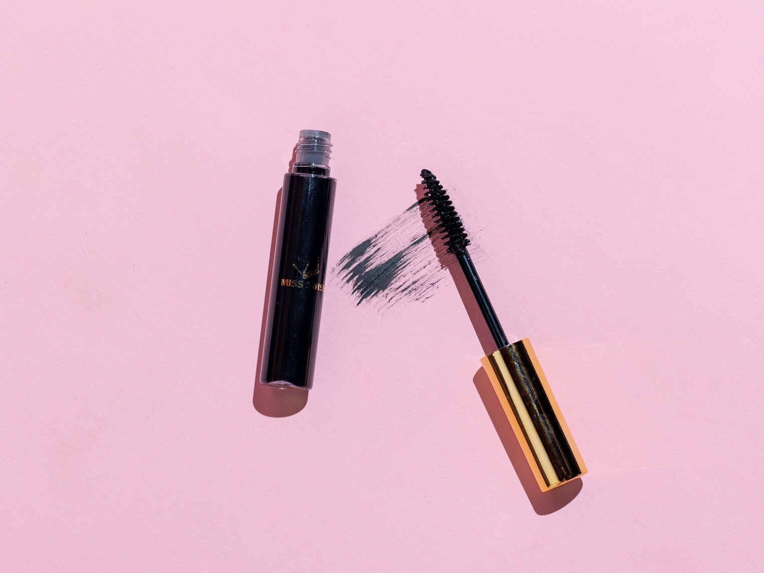 silver and black makeup brush