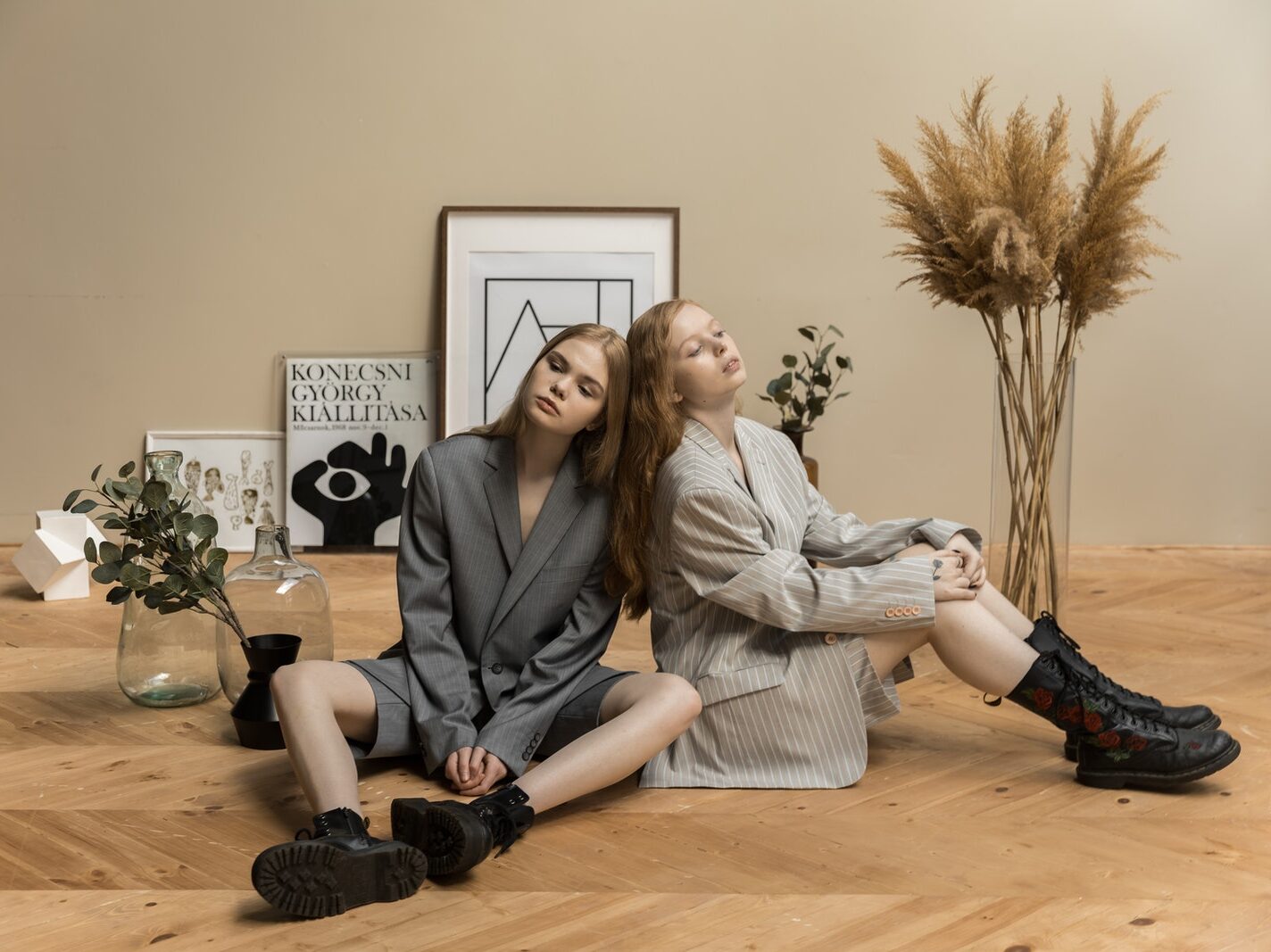 2 Women Sitting on Floor