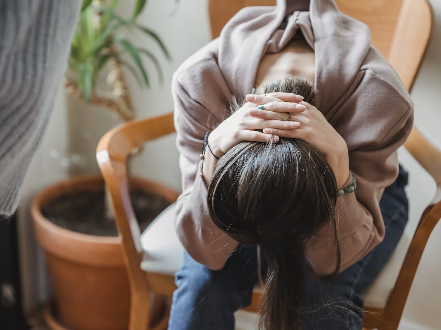 Unrecognizable woman having dispute with crop person