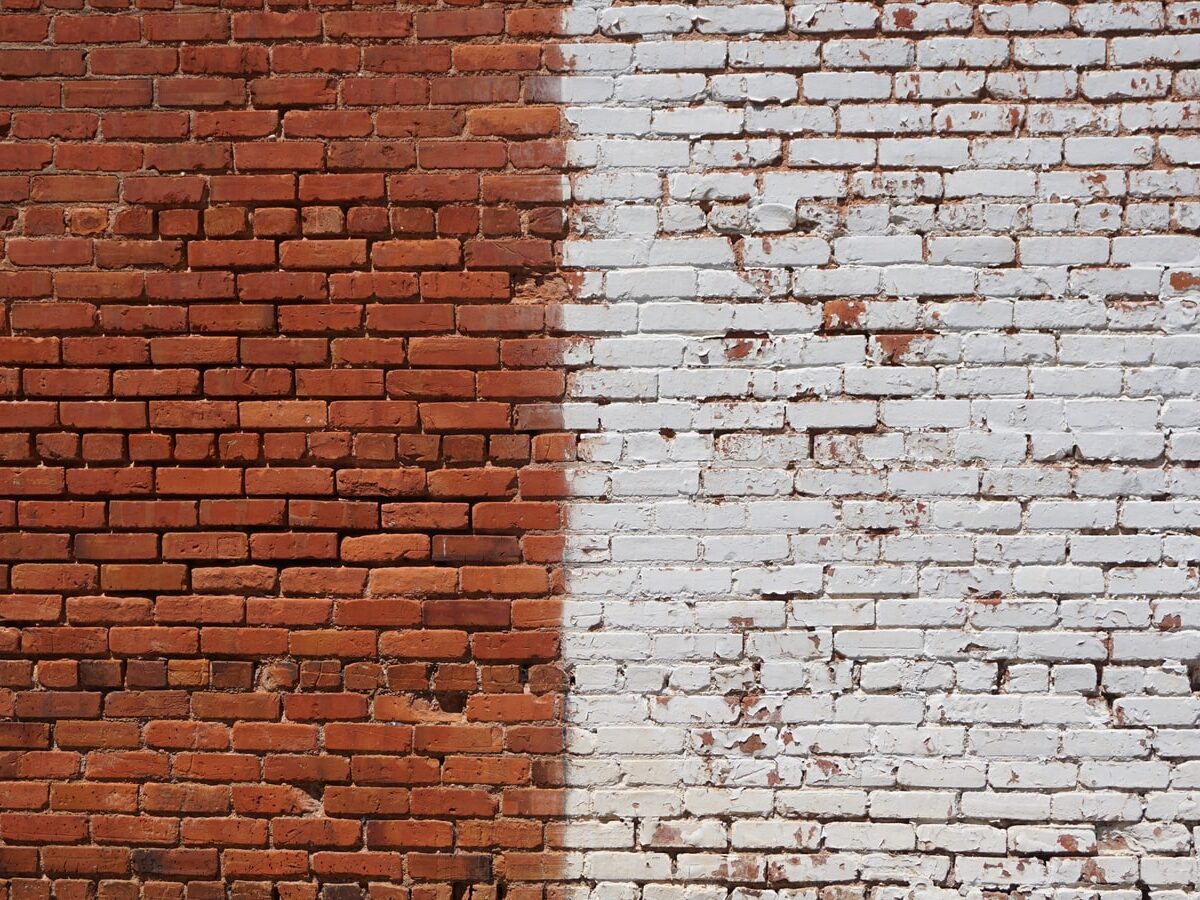 photo of white and brown bricked wall during daytime