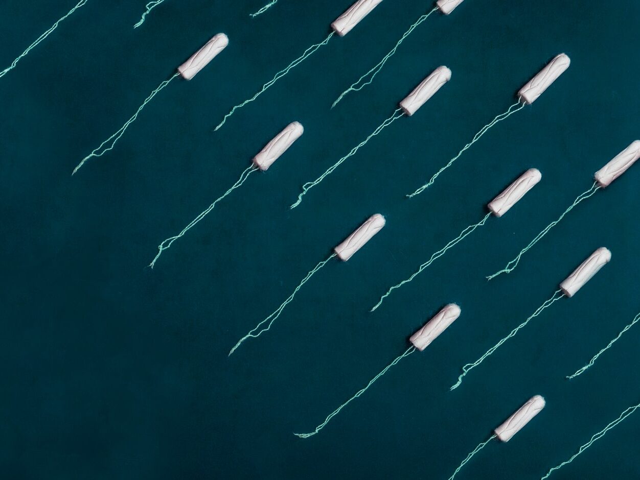 white strings on blue surface