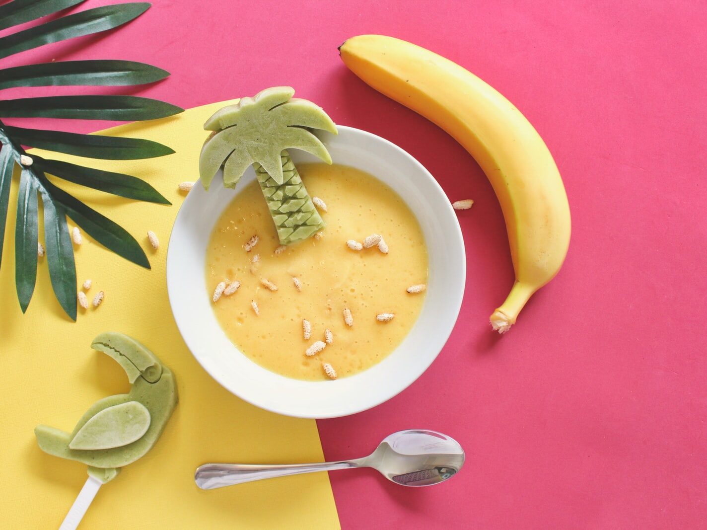 oatmeal on white bowl beside yellow banana