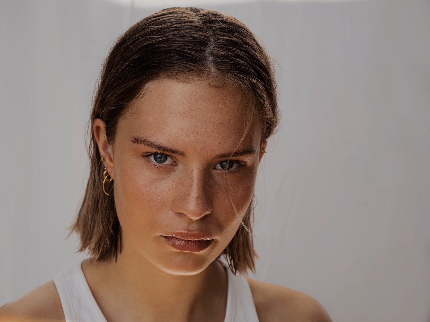 woman in white tank top