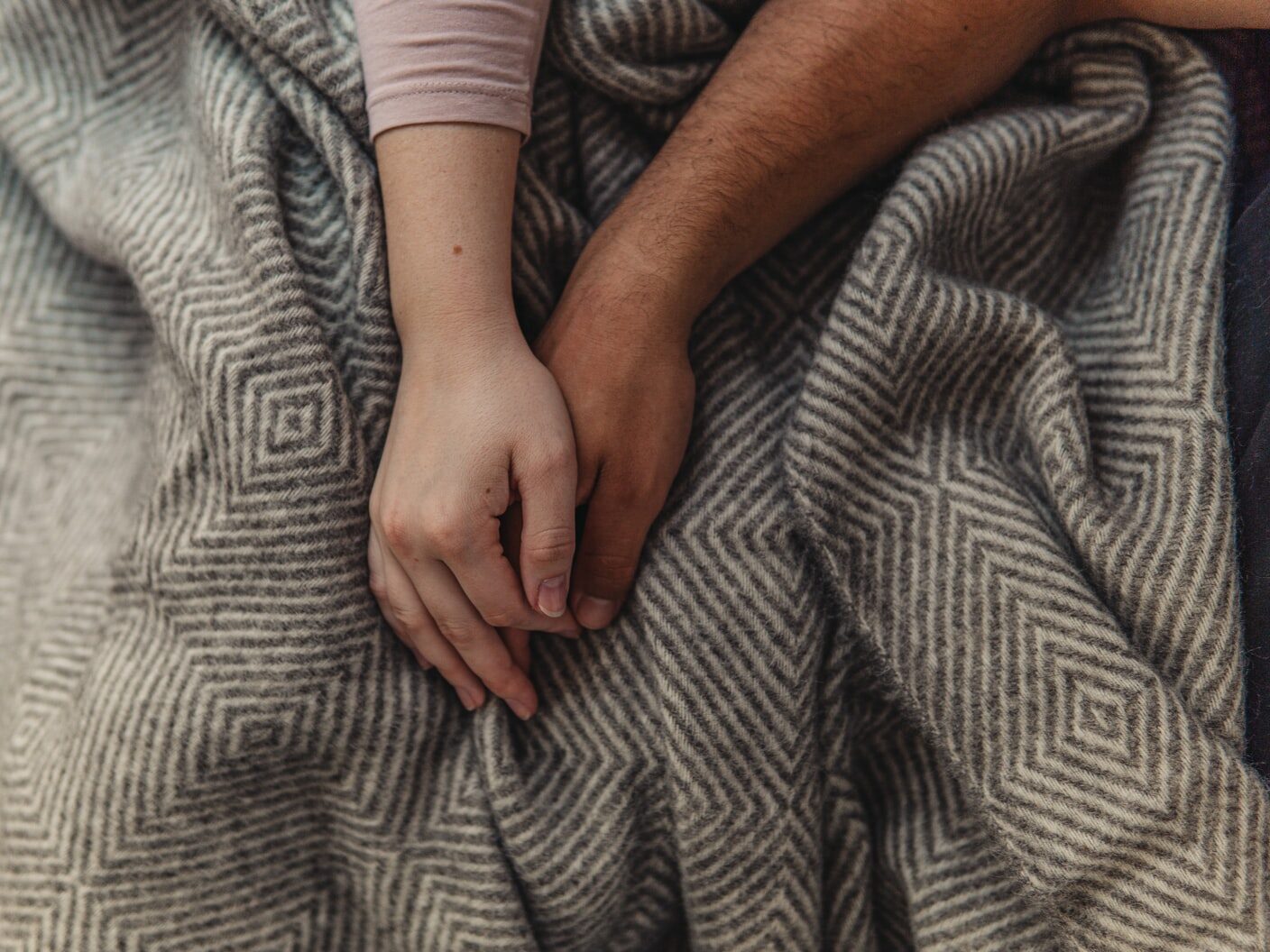 person in gray and white long sleeve shirt