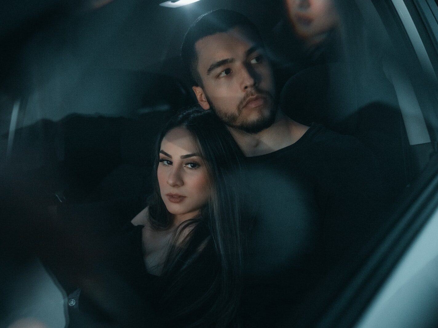 man and woman in car