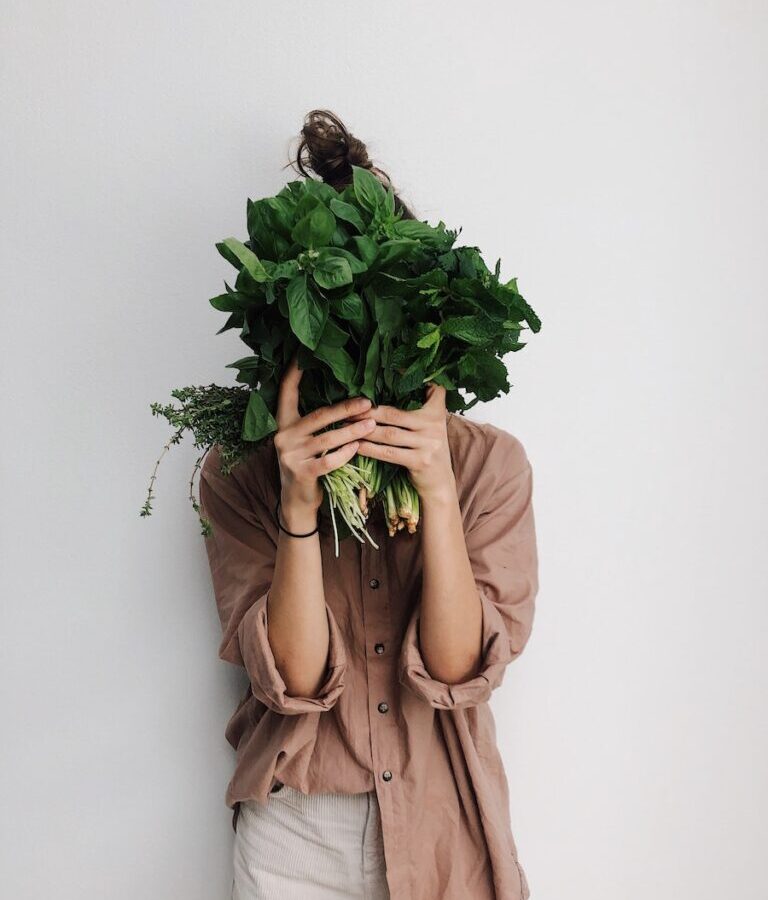 Person Holding Green Vegetables