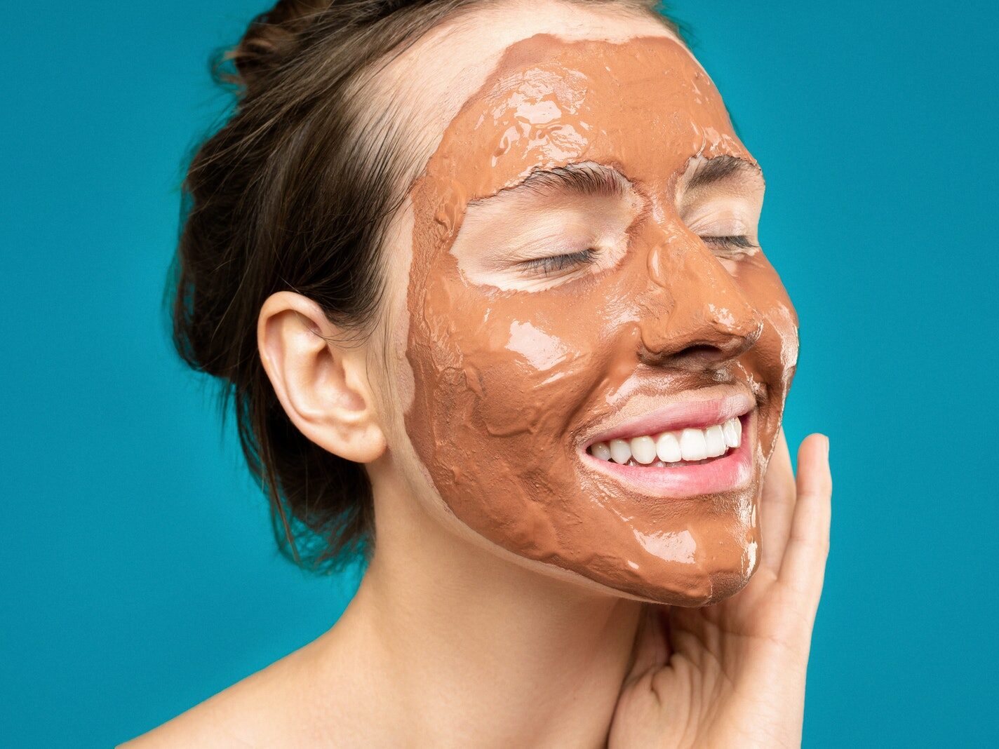 Woman With Clay Mask on Face
