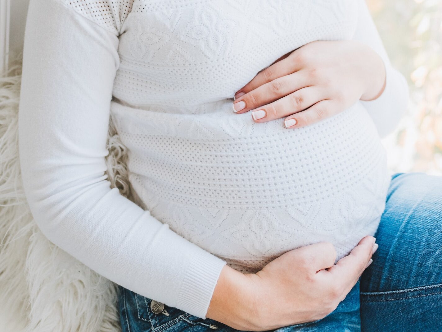 woman in white long sleeve shirt