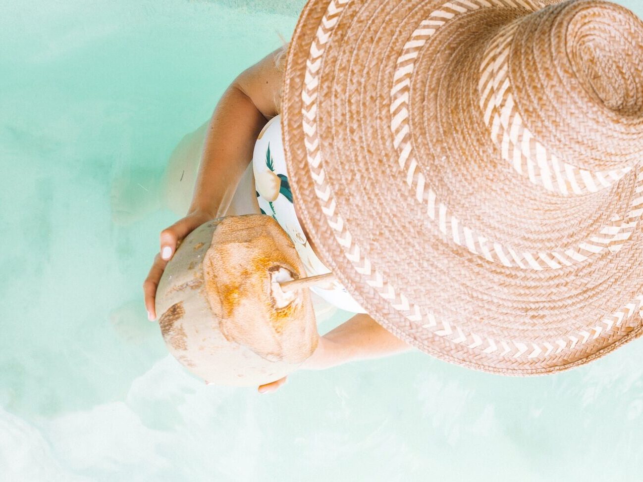 person holding coconut