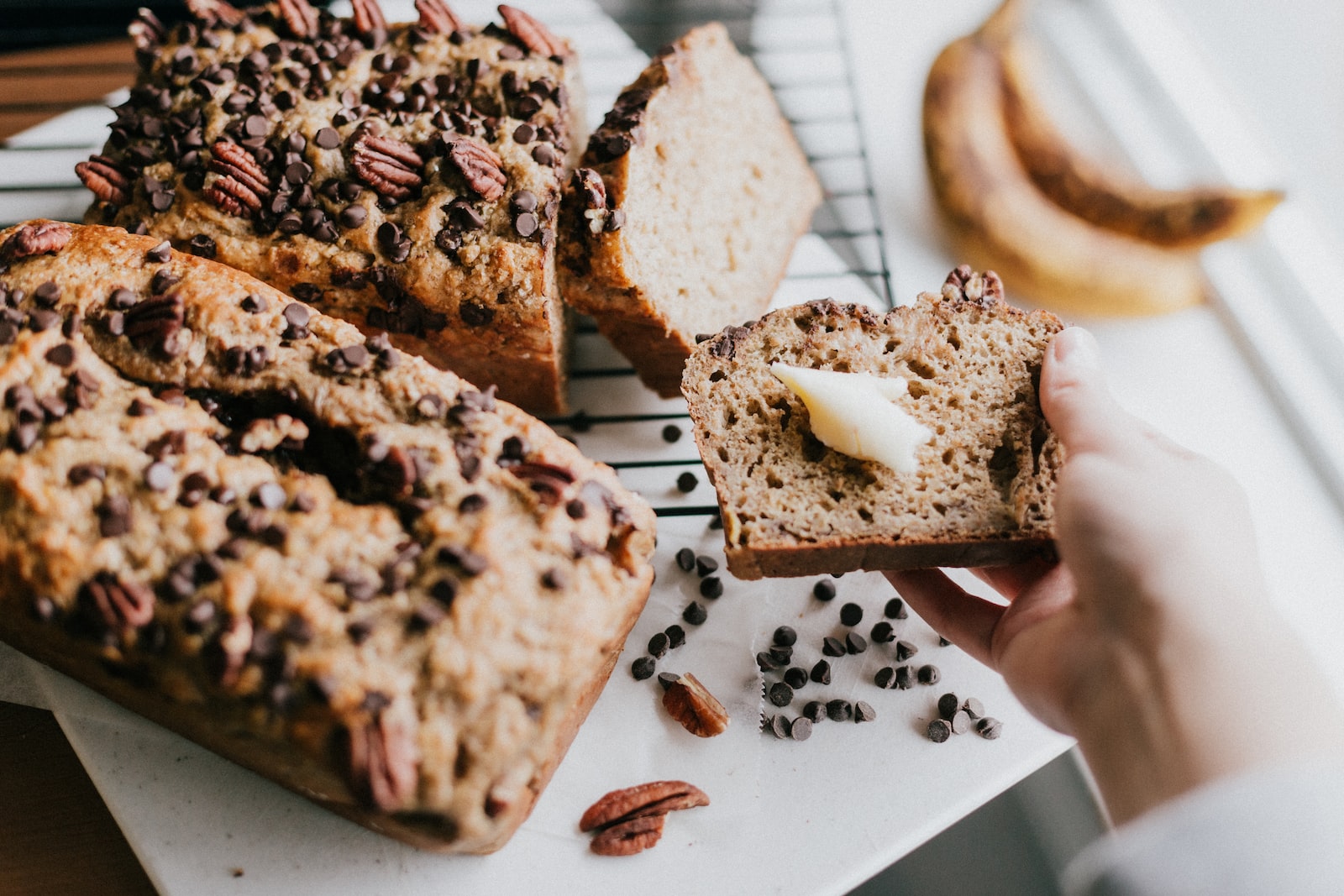 - ČasProŽeny.cz person holding bread with chocolate and milk