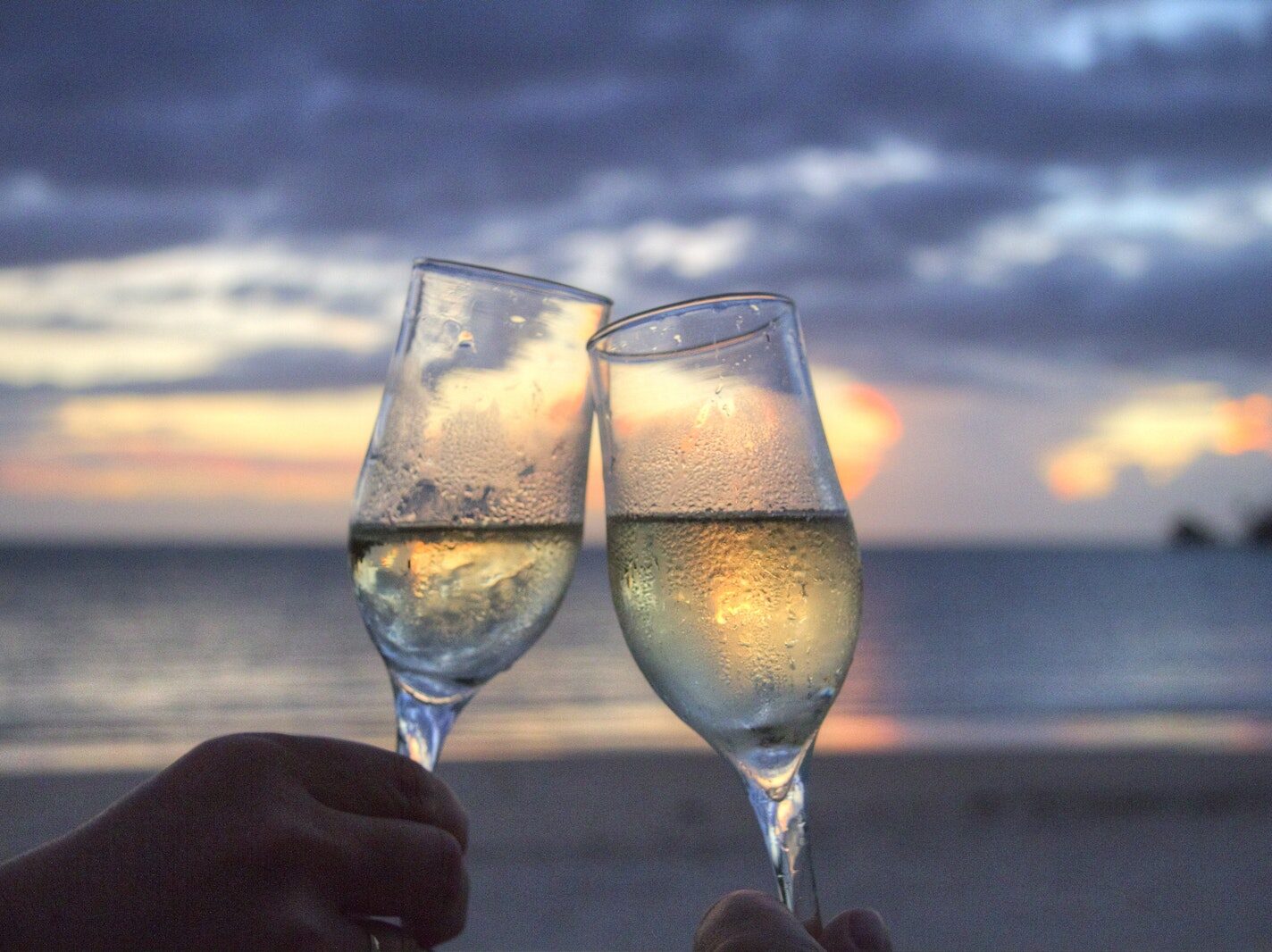 Two People Toasting Flute Glasses