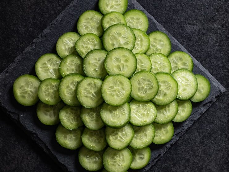 green round fruit on black textile