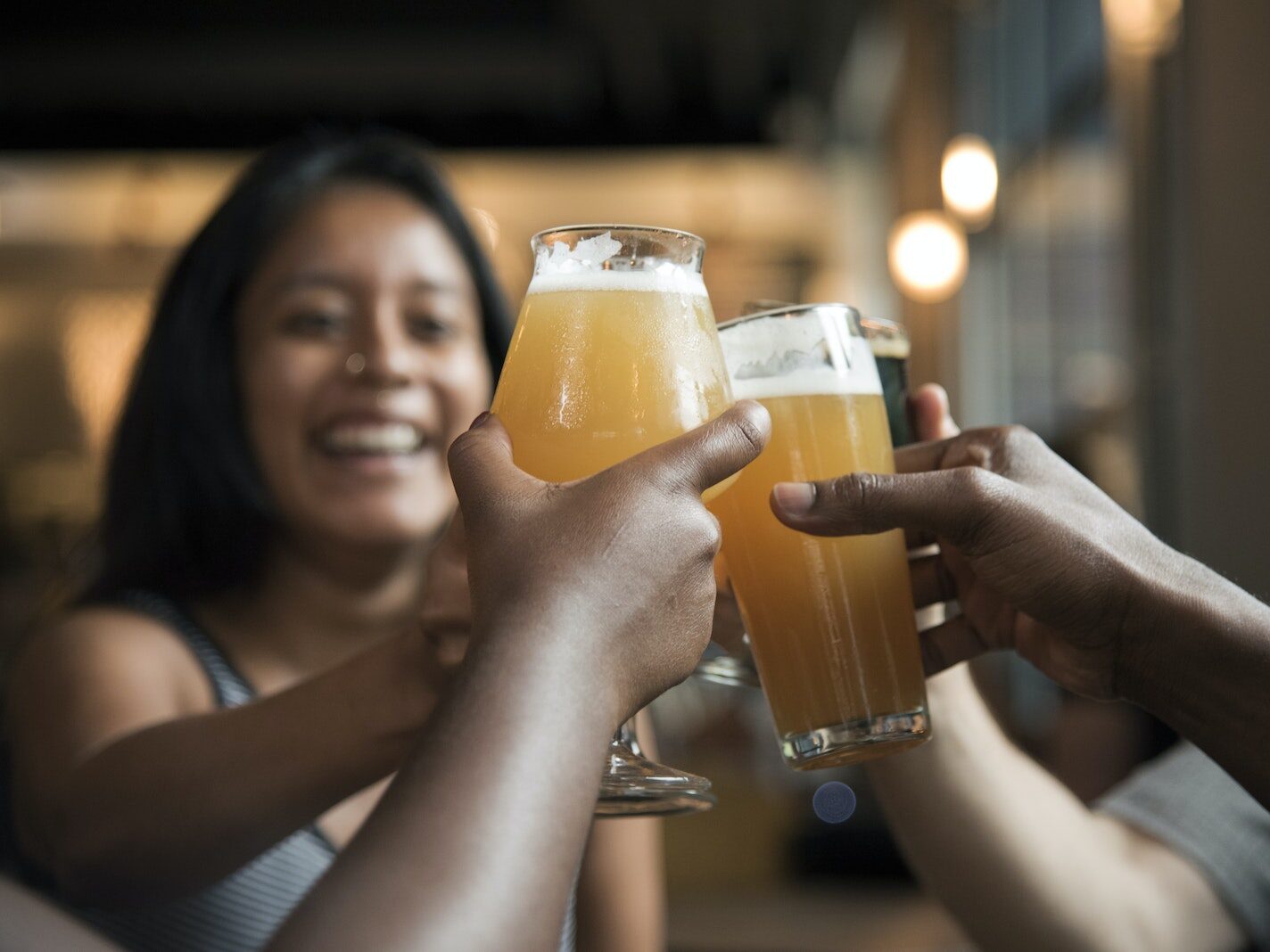 People Doing Cheers Inside Building