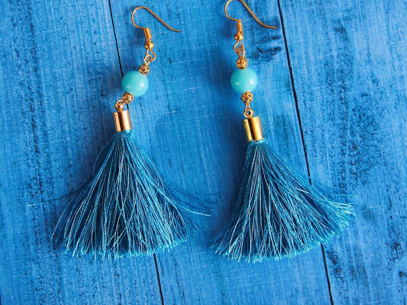Close-Up Photography of Blue Earrings
