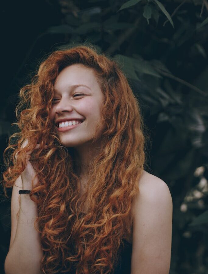 Smiling Woman With Red Hair