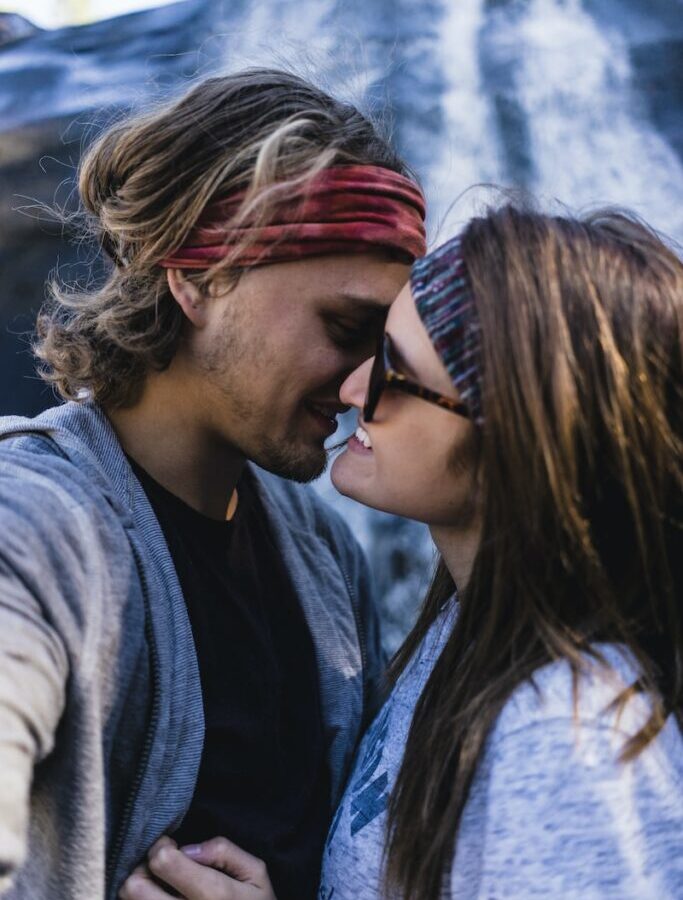 man and woman about to kiss each other