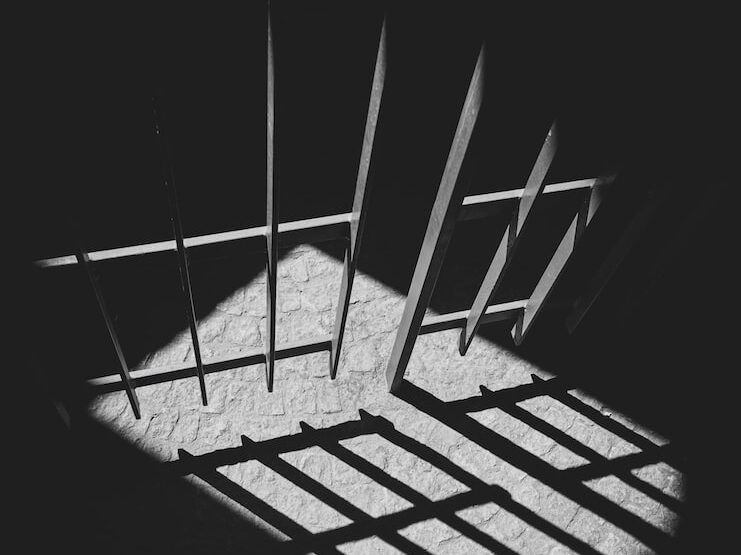 black metal frame in grayscale photography