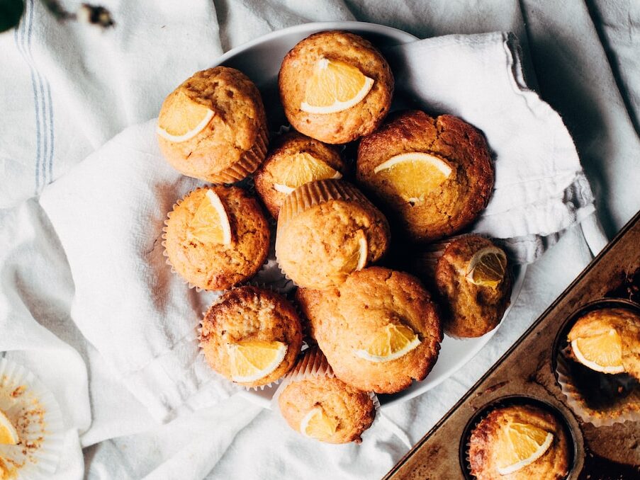 pile of muffin on white bowl