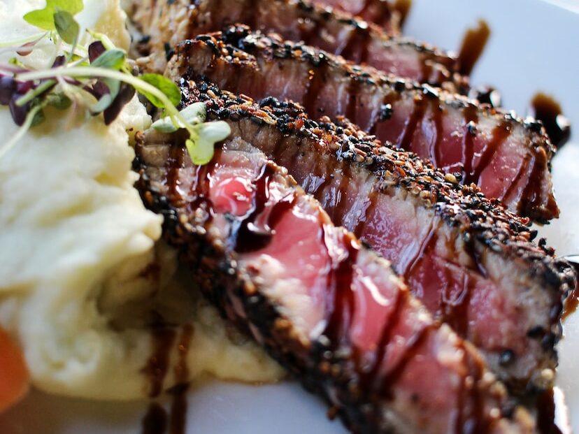 brown and white cake on white ceramic plate