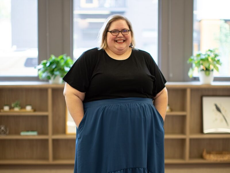 smiling woman wearing eyeglasses