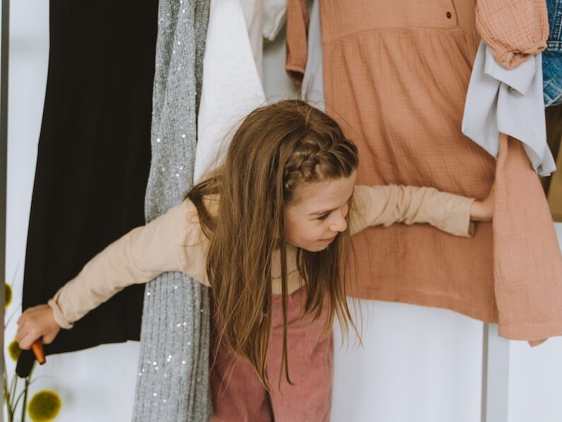 A Girls Standing in the Closet