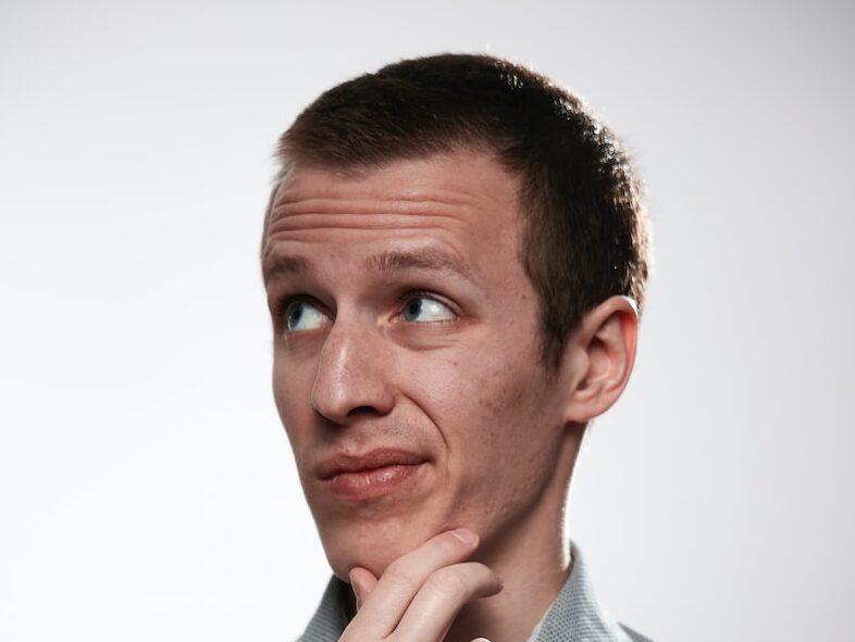 man in gray button up shirt