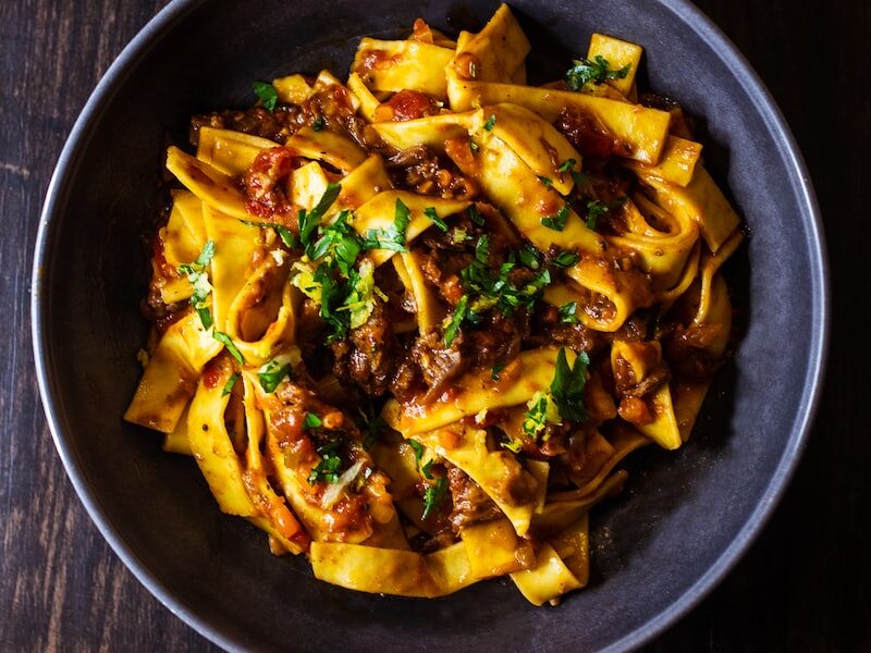 pasta dish on black ceramic bowl