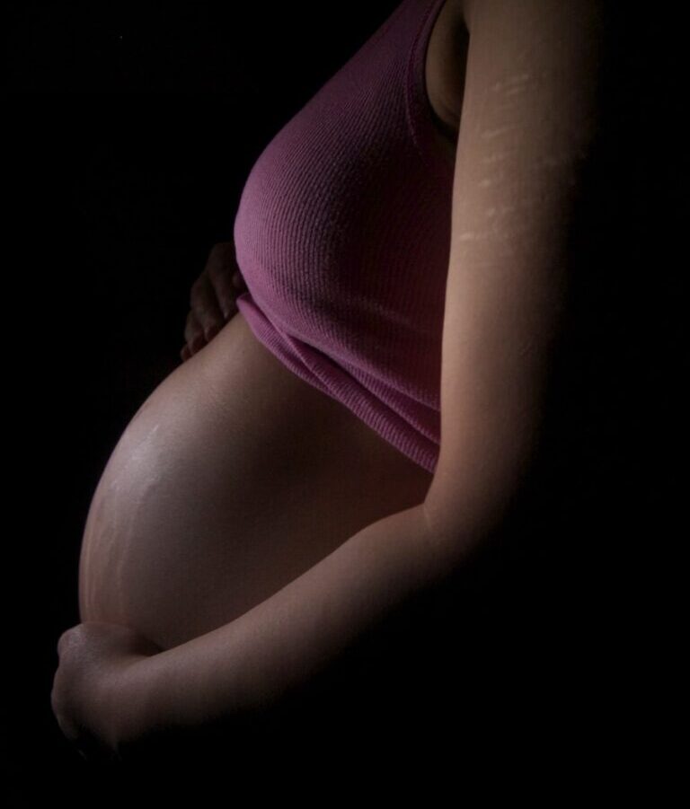 woman in pink panty and bra