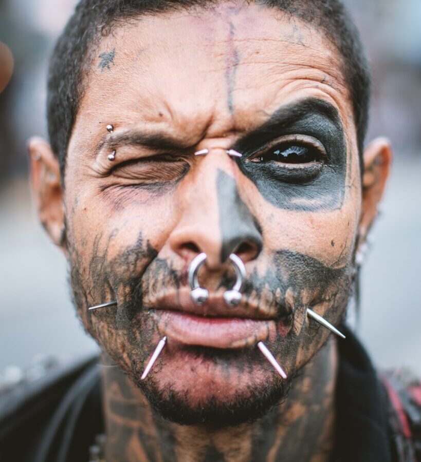 man with silver nose piercing