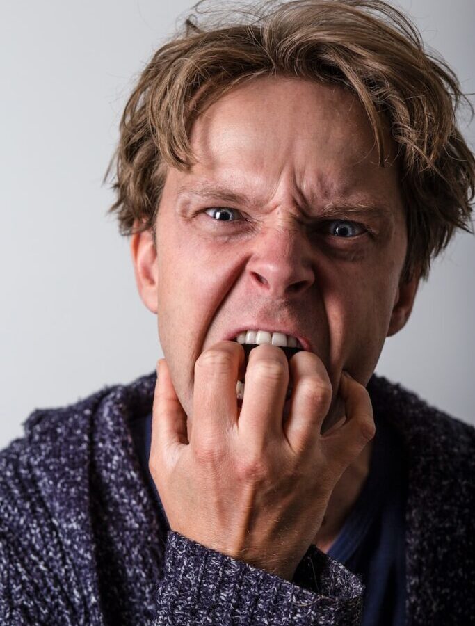 man in blue and white long sleeve shirt