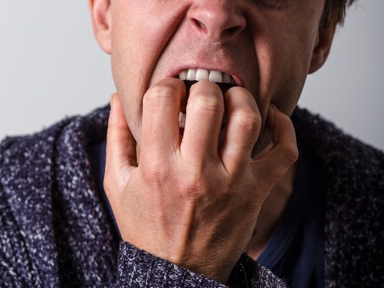 man in blue and white long sleeve shirt