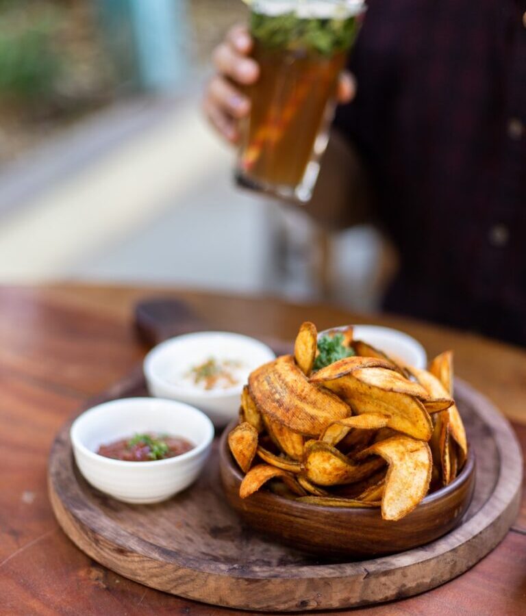 burger and fries on white ceramic plate