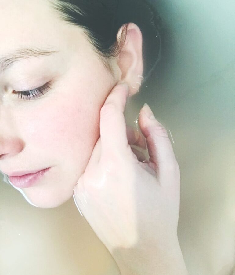 woman soaked in water