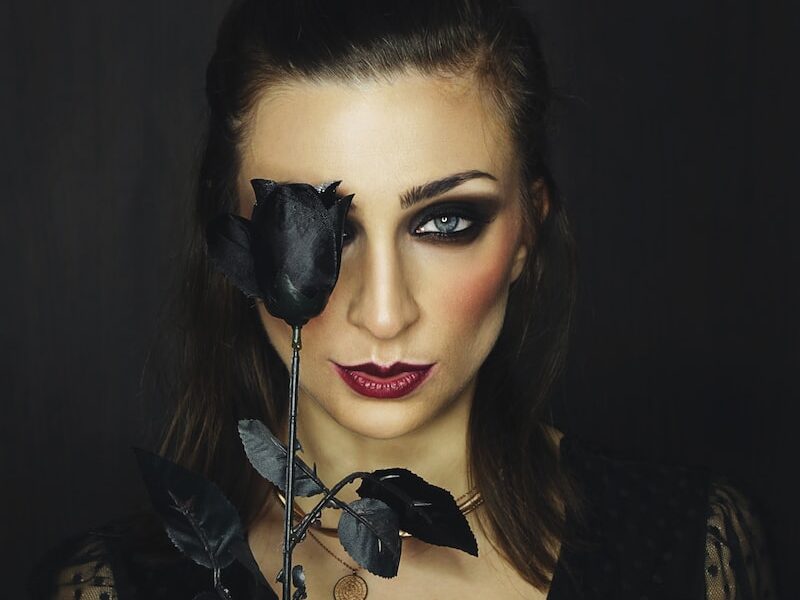 woman in black and white polka dot shirt