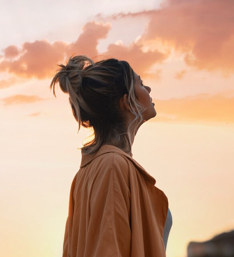 Woman Looking Towards the Sky